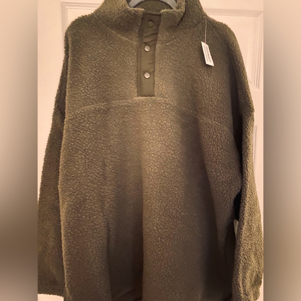 Brand new with tags! Olive Green Women’s Fleece pull over with buttons.